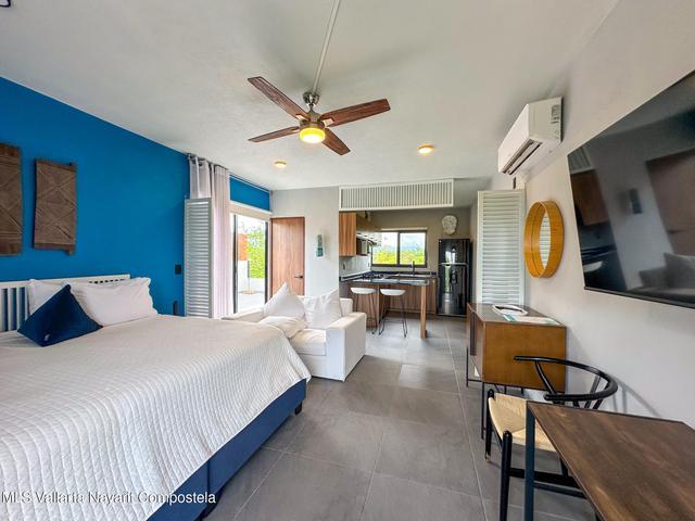 403 Paseo Foresta E7, Condo Neem